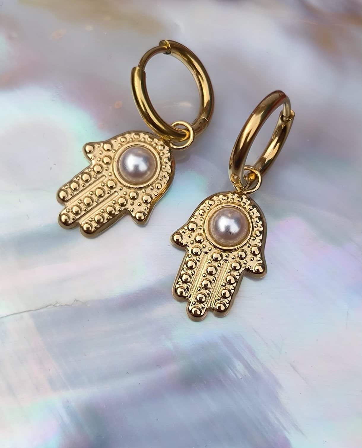 Boucle d'oreille main perlé