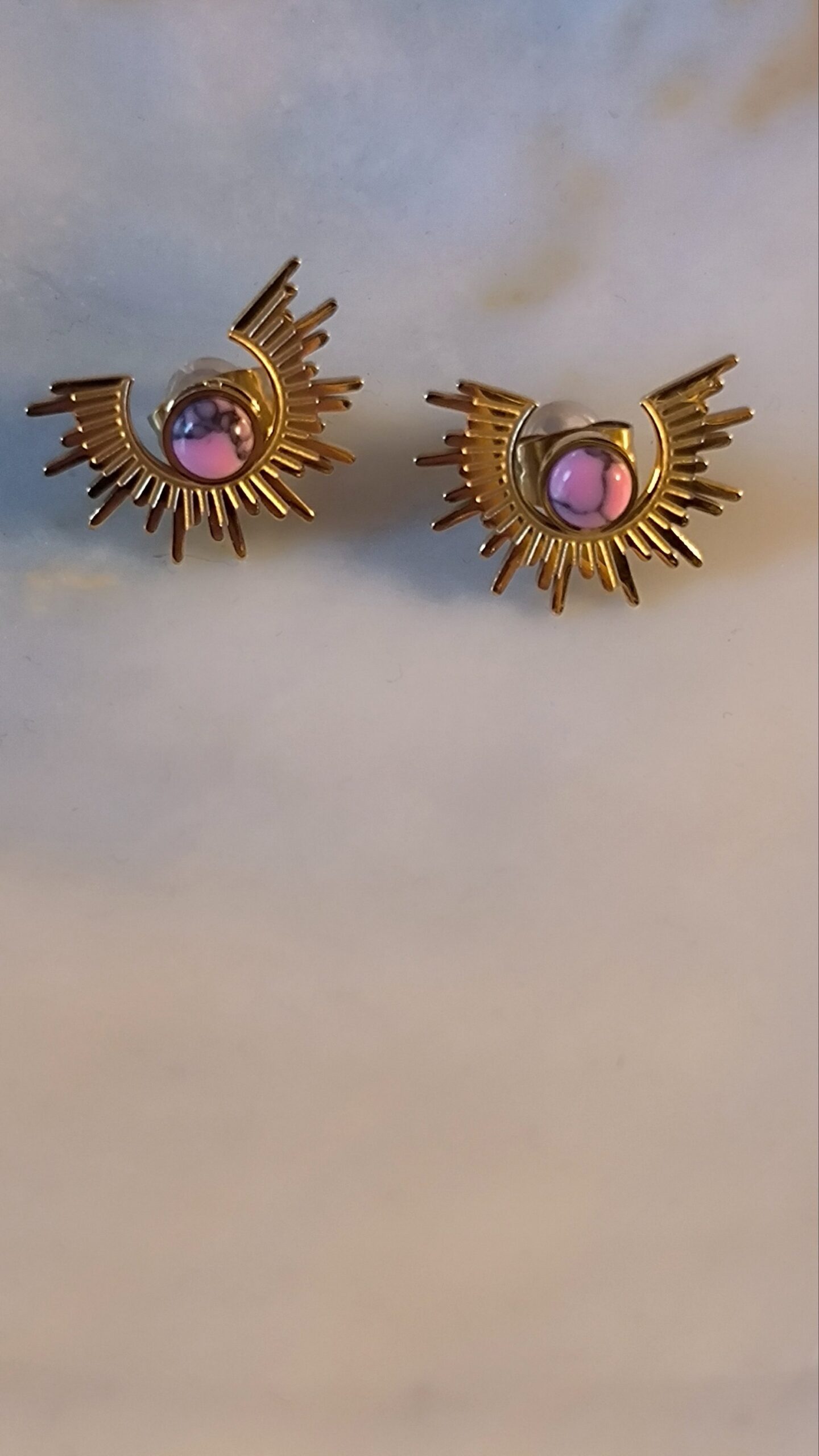 Boucle d'oreille soleil